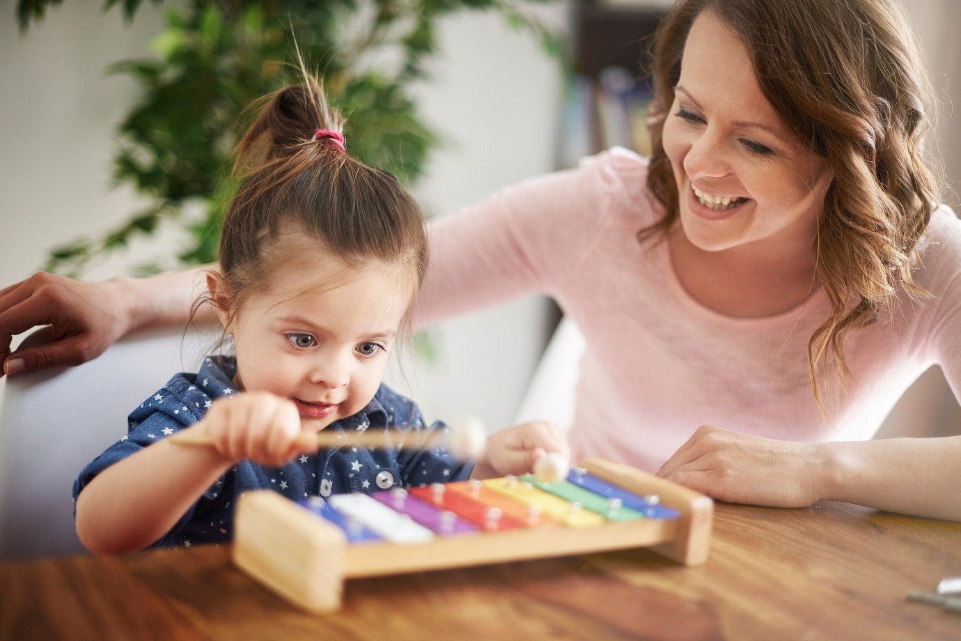 mother-daughter-playing-together